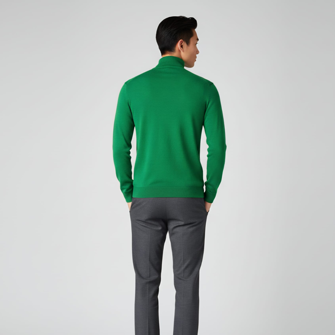 Minimalistyczny męski strój składający się z intensywnie zielonego golfu i szarych spodni, pokazany z przodu, z profilu i z tyłu.