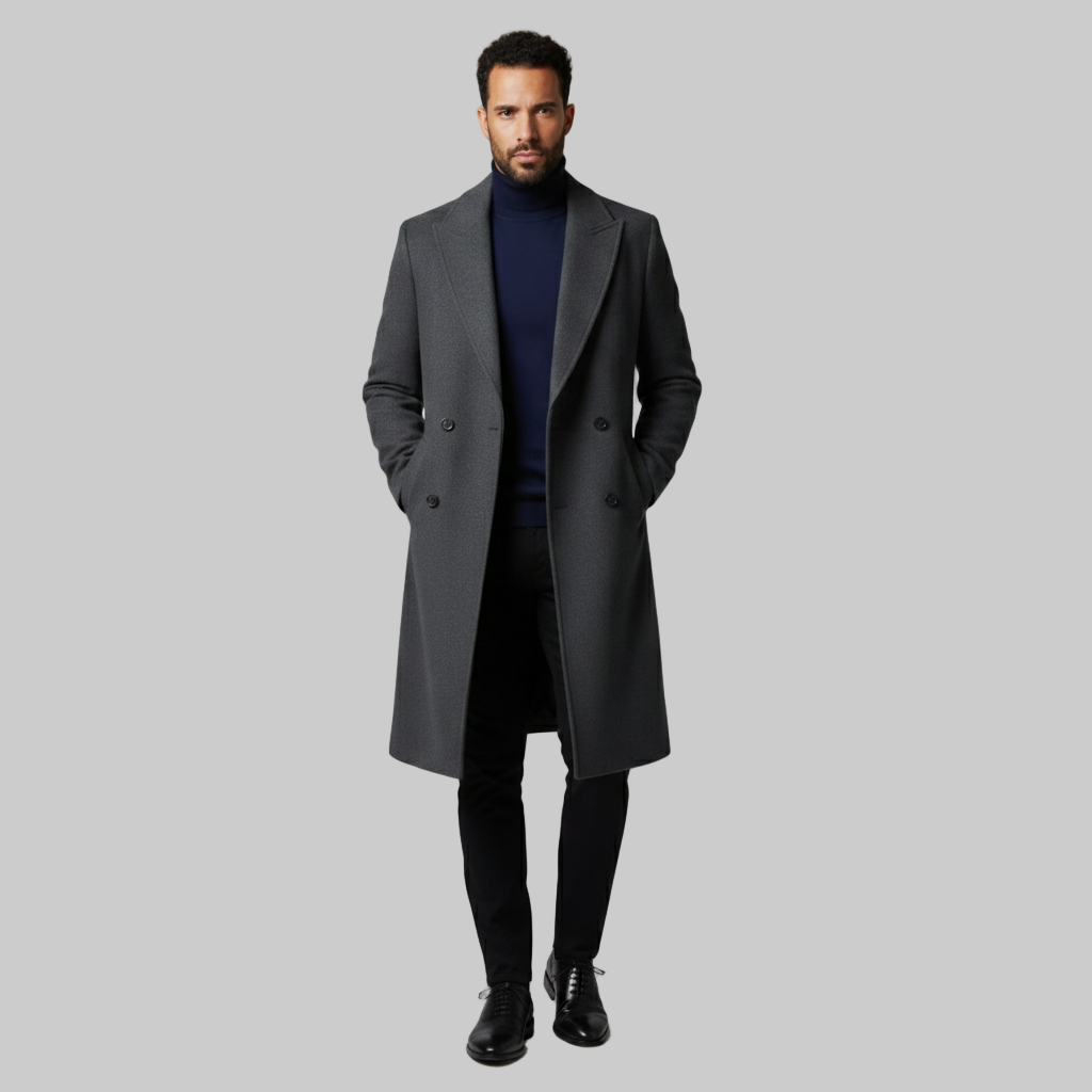 ciemnoszary długi płaszcz w połączeniu z granatowym golfem i wąskimi czarnymi spodniami.
