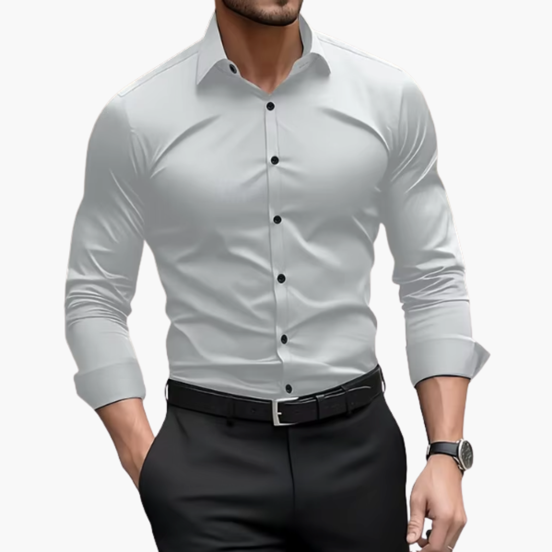 Koszula męska o dopasowanym kroju kołnierzyk spiczasty, mankiety zapinane na guziki, zaokrąglony dół