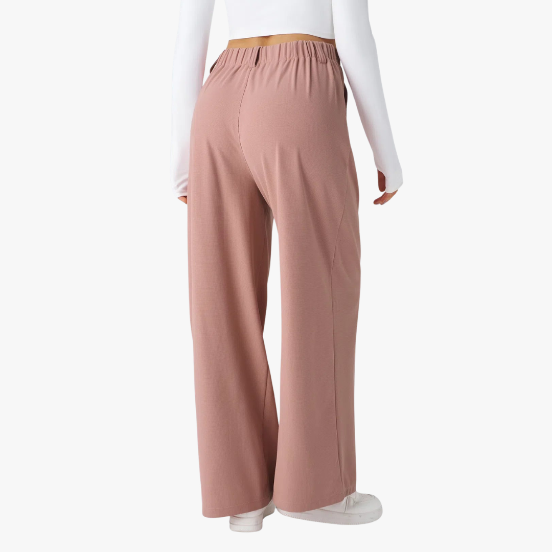 Spodnie z wysokim stanem i szerokimi nogawkami plisowany przód, elastyczny pas, luźny krój